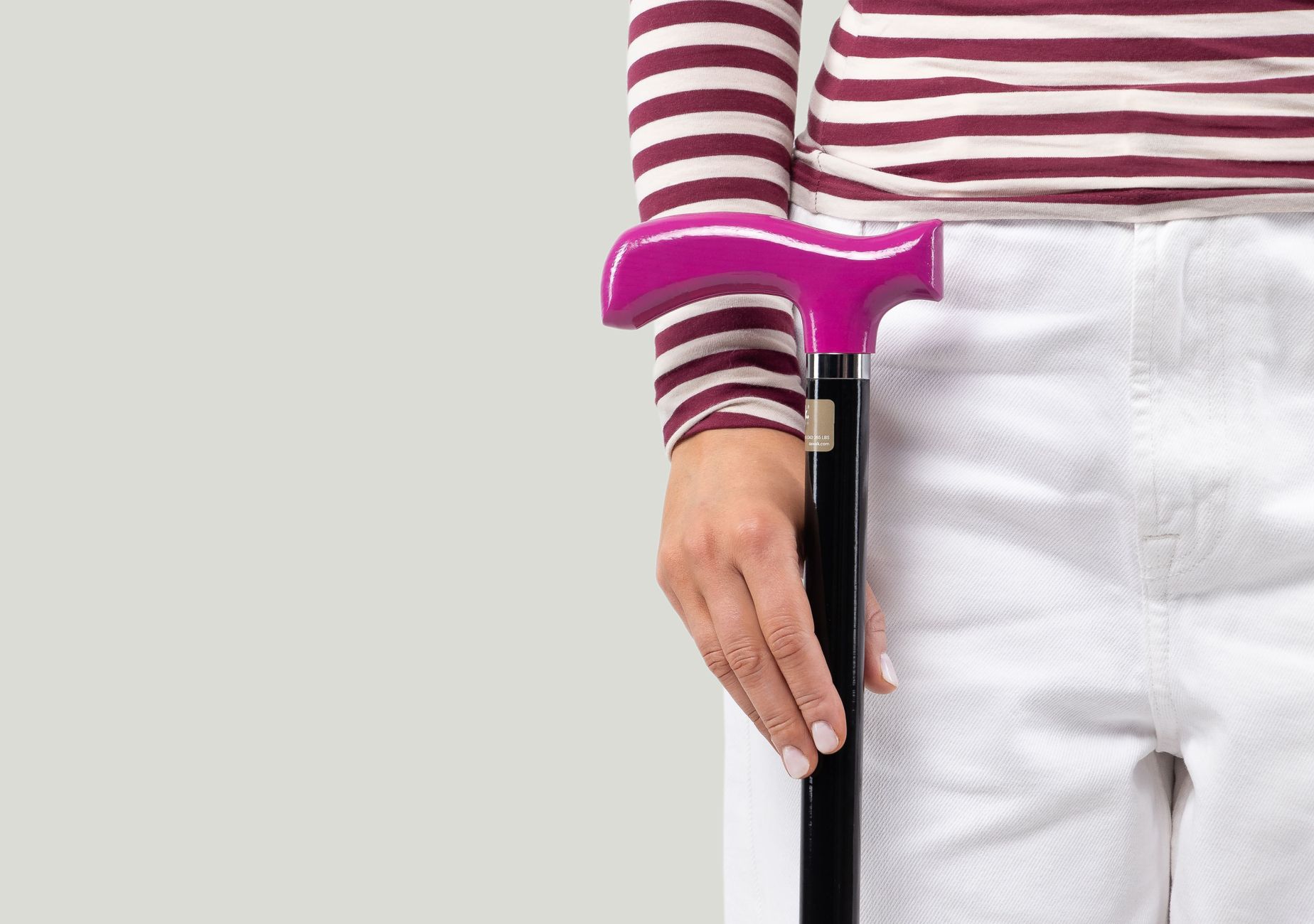 stylish pink handled cane for modern mobility